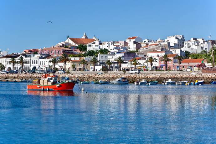 Take a boat tour along the coast of the Algarve